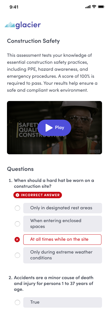 Visitor-facing construction safety assessment on mobile with a video to play and a question marked with an incorrect answer badge