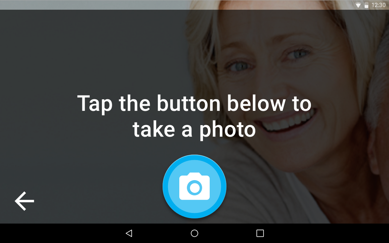 The photo screen: an instruction over a photo and a large camera button