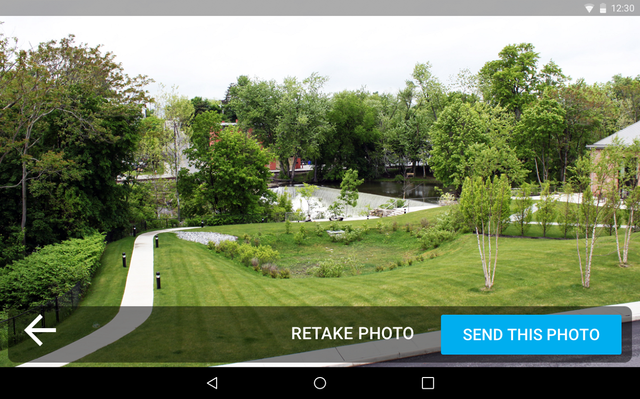 A selfie preview with Retake photo and Send this photo buttons